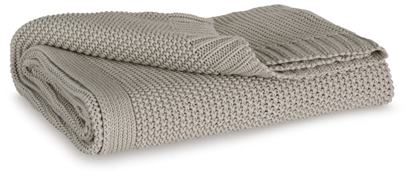 Your place is that much more relaxed and inviting with this cozy throw. Crafted with supreme softness in mind, its neutral hue pairs with a variety of decor. Whether this throw is at the foot of the bed or on the arm of your favorite chair, it-'s wonderfu