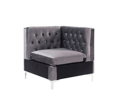 Nothing screams luxury like this Jaszira modular upholstery group. Each piece is enveloped in a luxurious velvet upholstery and showcasing button tufting, and a nail head trim accent for a tailored touch. Foam padding offers comfortable cushioning. Design
