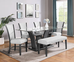 This sleek and modern dining group bridges form and function. The sculptural dining table has a sturdy base and the glass top allows views of the upholstered open shelf. Streamlined chairs and bench feature pewter finished wood and dove gray upholstery fo