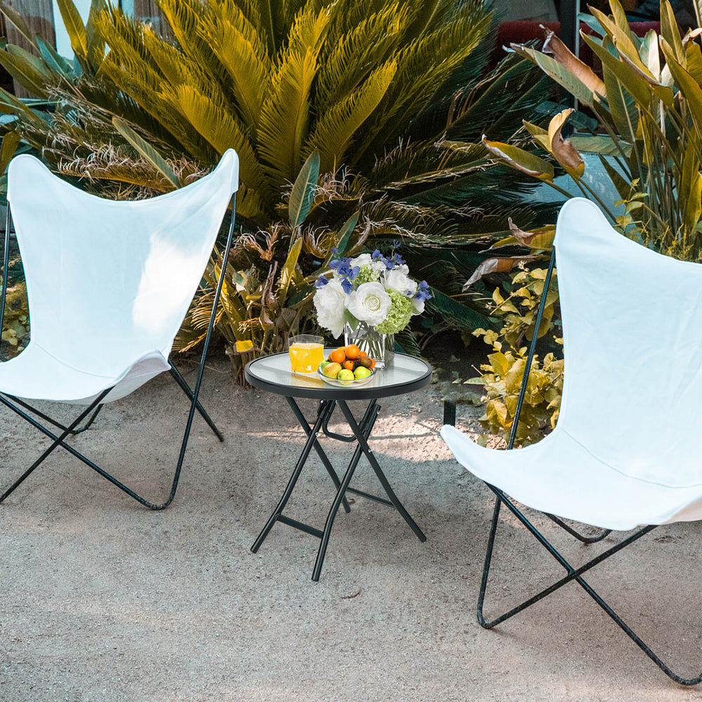 Bring this lightweight folding table anywhere you want! Â  This patio table is made of a rustproof steel frame and tempered glass tabletop  which features high density and can be used outdoors for a long time. 4 legs are equipped with non-slip foot pads t
