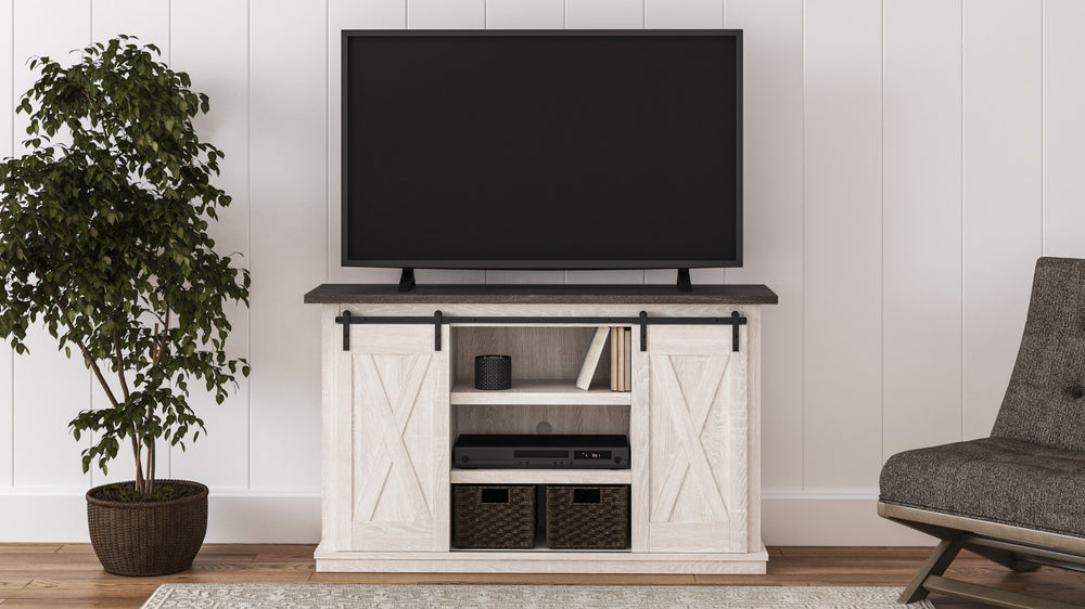 With its two-tone finish, crossbuck details and authentic charm, this TV stand is right in tune with your relaxed approach to high style. Beautifully made to accommodate your media equipment, itâ€™s well equipped with adjustable shelving, cutouts for wire